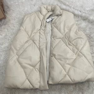 Oversized cream vegan leather quilted vest. Size large, women’s. New with tags.